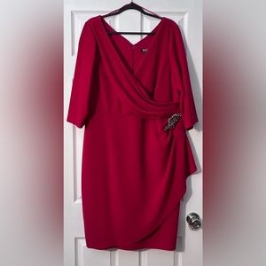 Red, sparkly knee length dress.